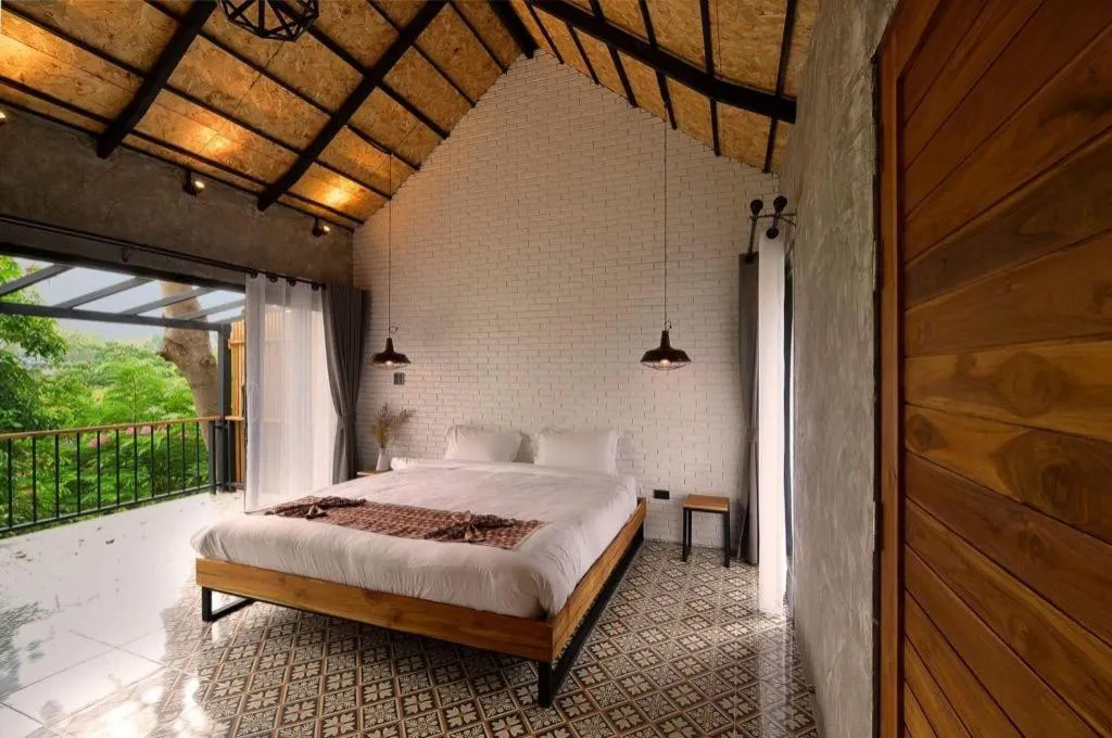 Bed in Cocoa Valley Resort