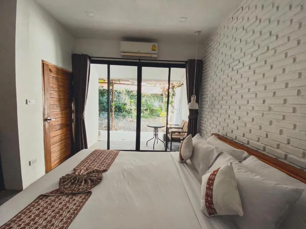 Bed in Cocoa Valley Resort