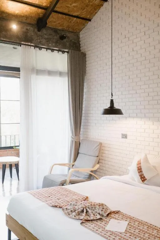 Bed in Cocoa Valley Resort