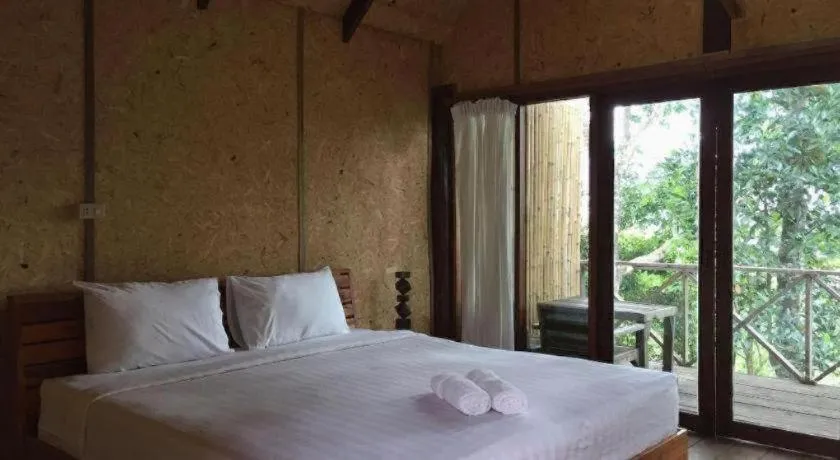 Bed in Cocoa Valley Resort