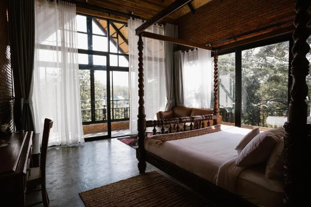 Bed in Cocoa Valley Resort