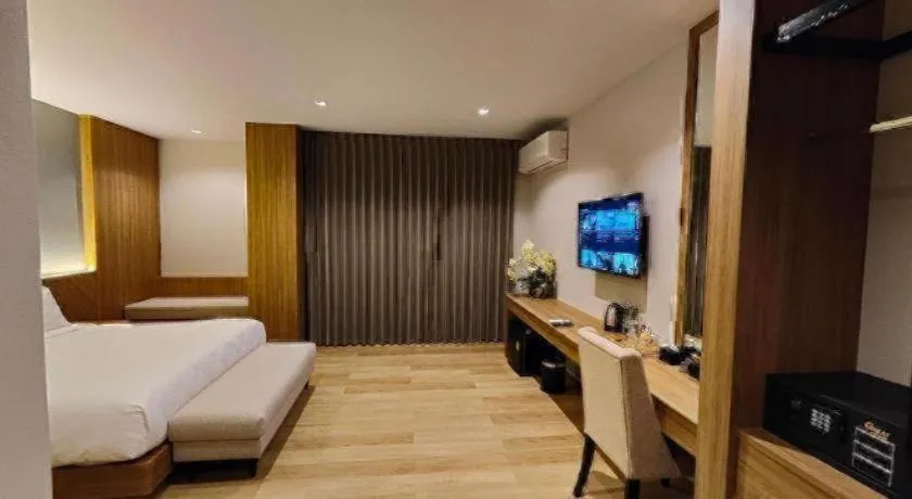 Bed in Butterfly Princess Hotel