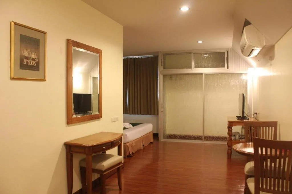 Bed in Butterfly Princess Hotel