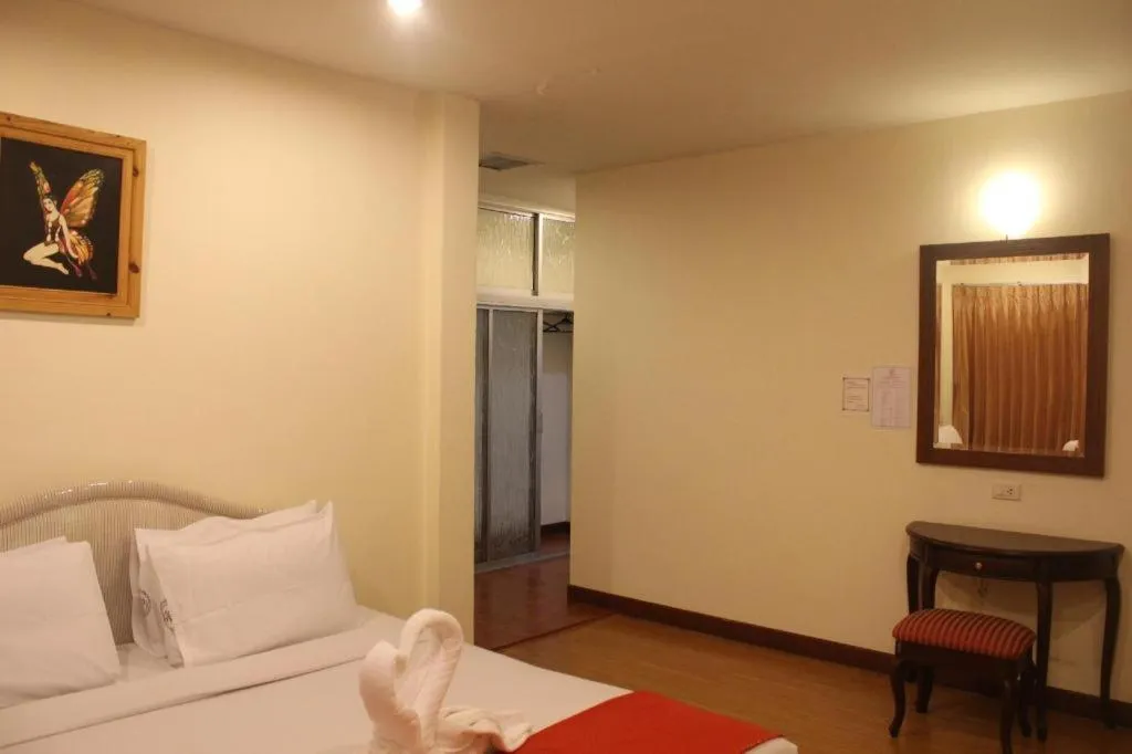 Bed in Butterfly Princess Hotel