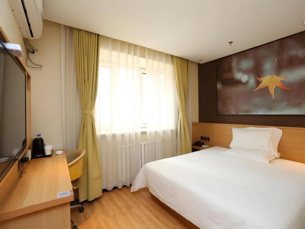 Bed in IU Hotel Tianjin Xiqing Zhong Bei Zhen Branch