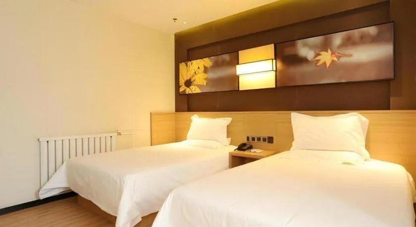 Bed in IU Hotel Tianjin Xiqing Zhong Bei Zhen Branch