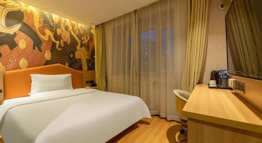 Bed in IU Hotel Tianjin Xiqing Zhong Bei Zhen Branch