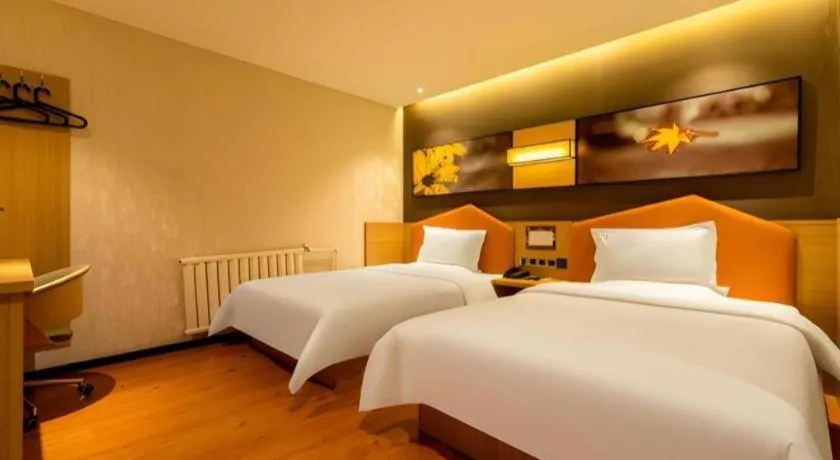 Bed in IU Hotel Tianjin Xiqing Zhong Bei Zhen Branch