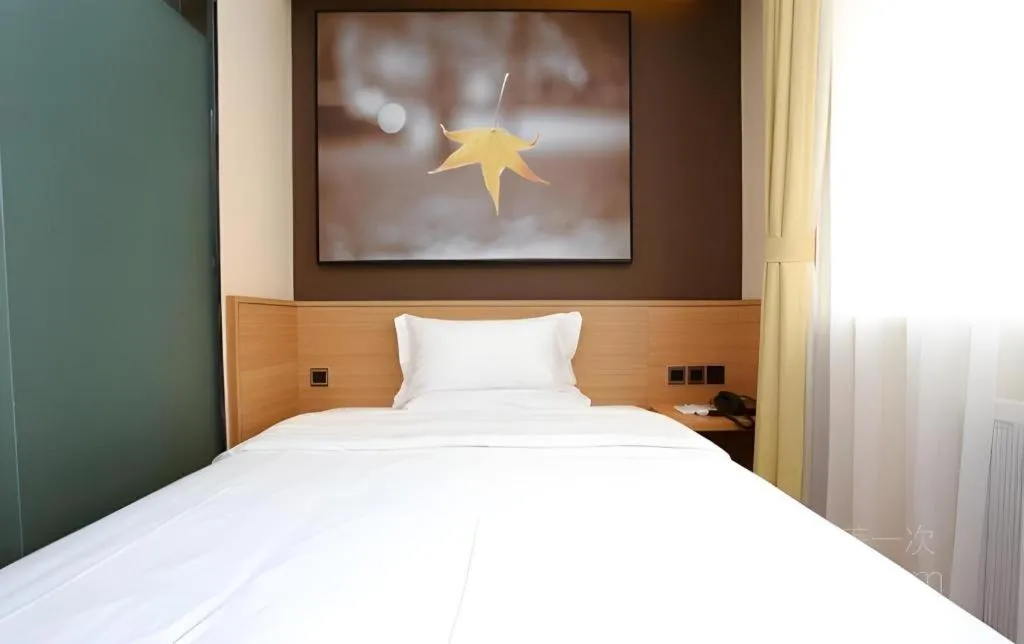 Bed in IU Hotel Tianjin Xiqing Zhong Bei Zhen Branch