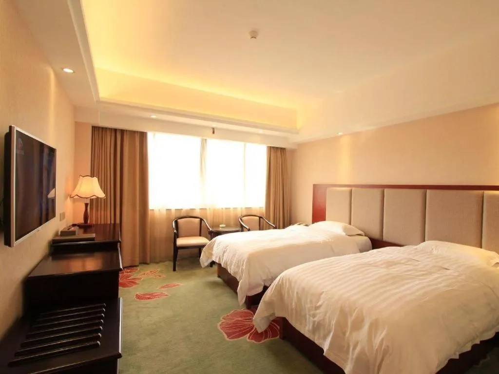 Bed in Gui Feng Hotel