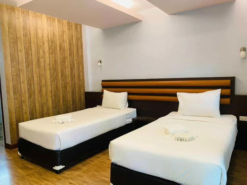 Bed in Phuphayot Resort