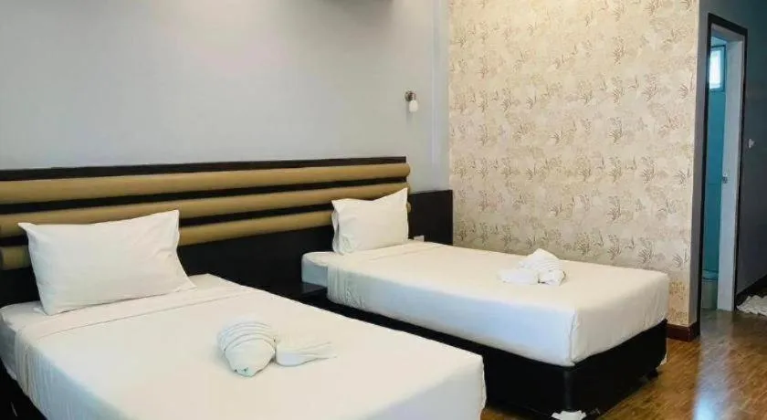 Bed in Phuphayot Resort