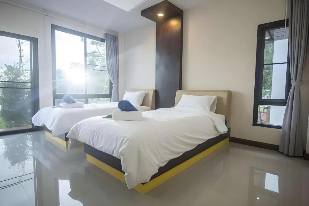 Bed in Phuphayot Resort