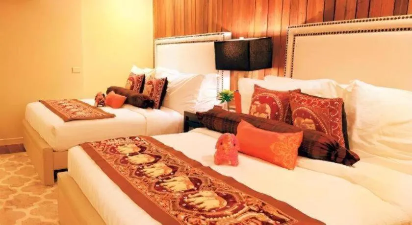 Bed in The Oriental Luxury Suites Tagaytay