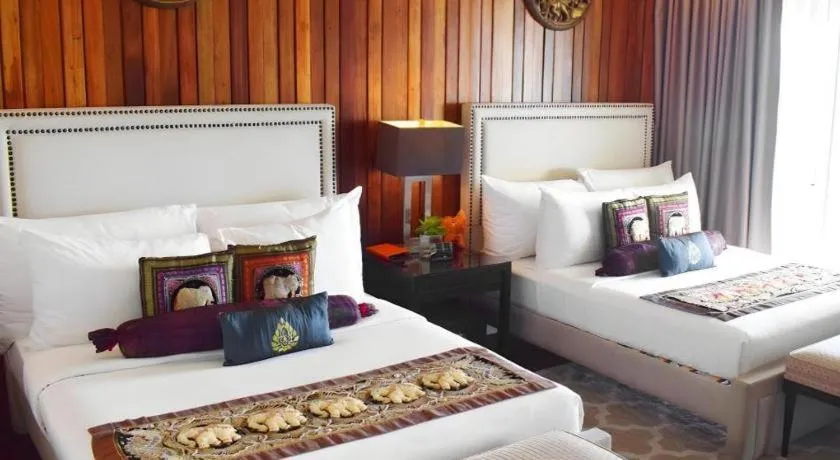 Bed in The Oriental Luxury Suites Tagaytay