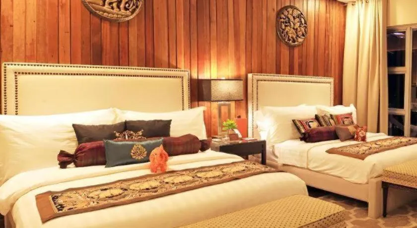 Bed in The Oriental Luxury Suites Tagaytay