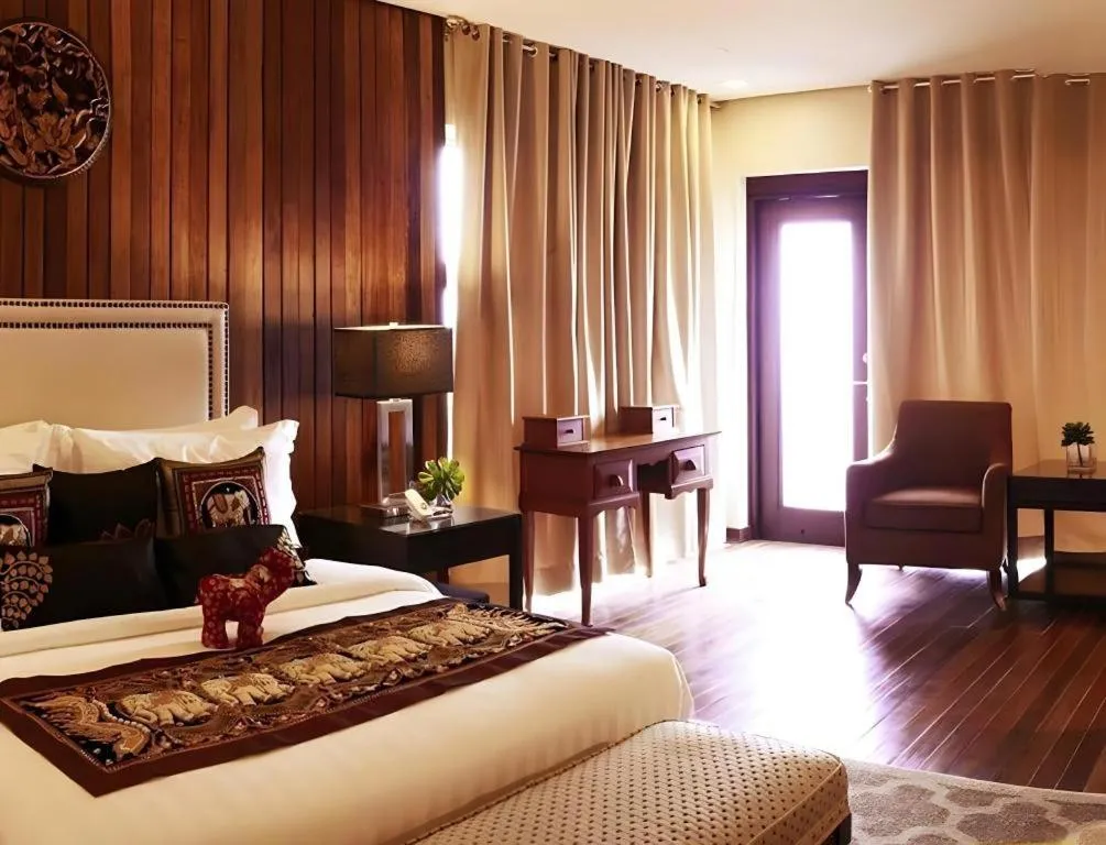 Bed in The Oriental Luxury Suites Tagaytay