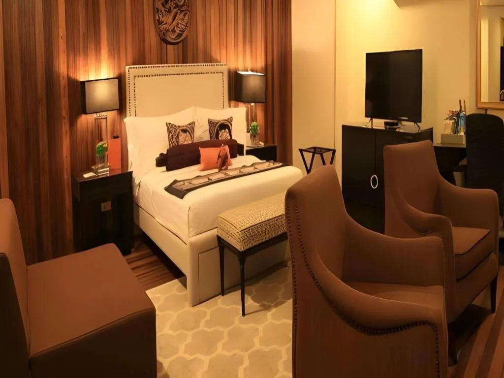 Bed in The Oriental Luxury Suites Tagaytay