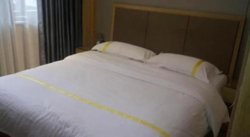 Bed in Mao Hua hotel