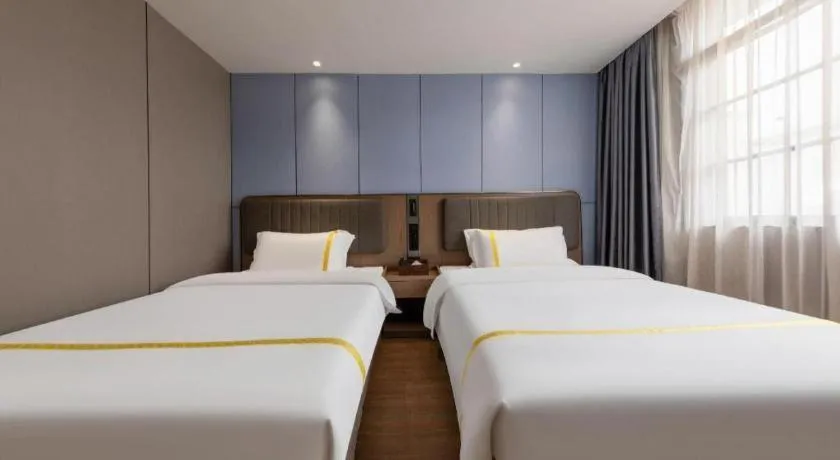 Bed in Mao Hua hotel