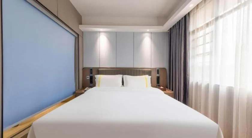 Bed in Mao Hua hotel