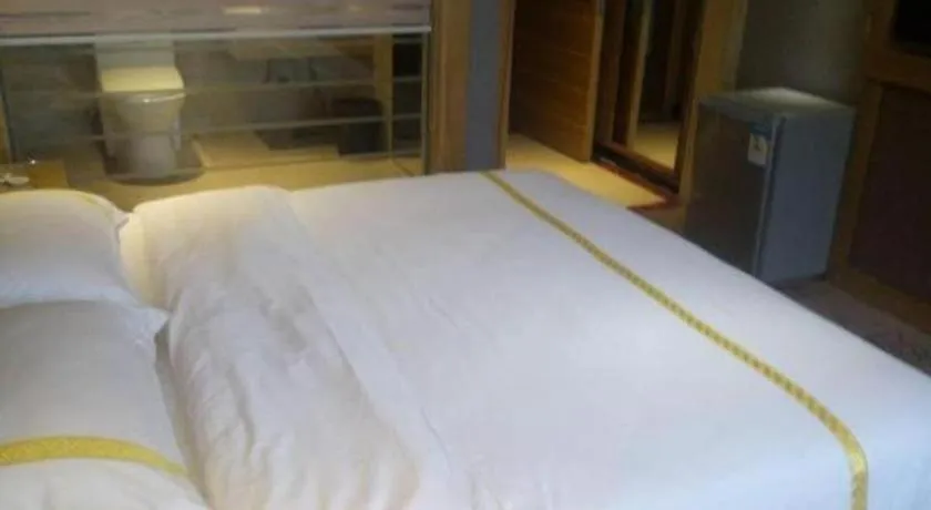 Bed in Mao Hua hotel