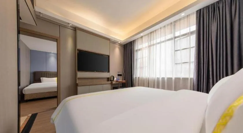 Bed in Mao Hua hotel