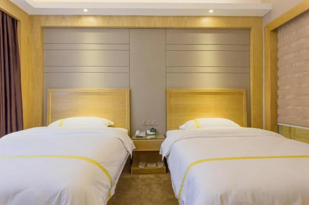 Bed in Mao Hua hotel