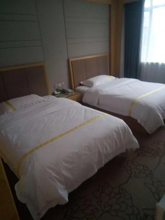 Bed in Mao Hua hotel