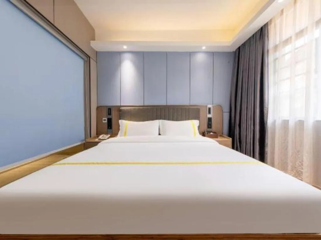 Bed in Mao Hua hotel