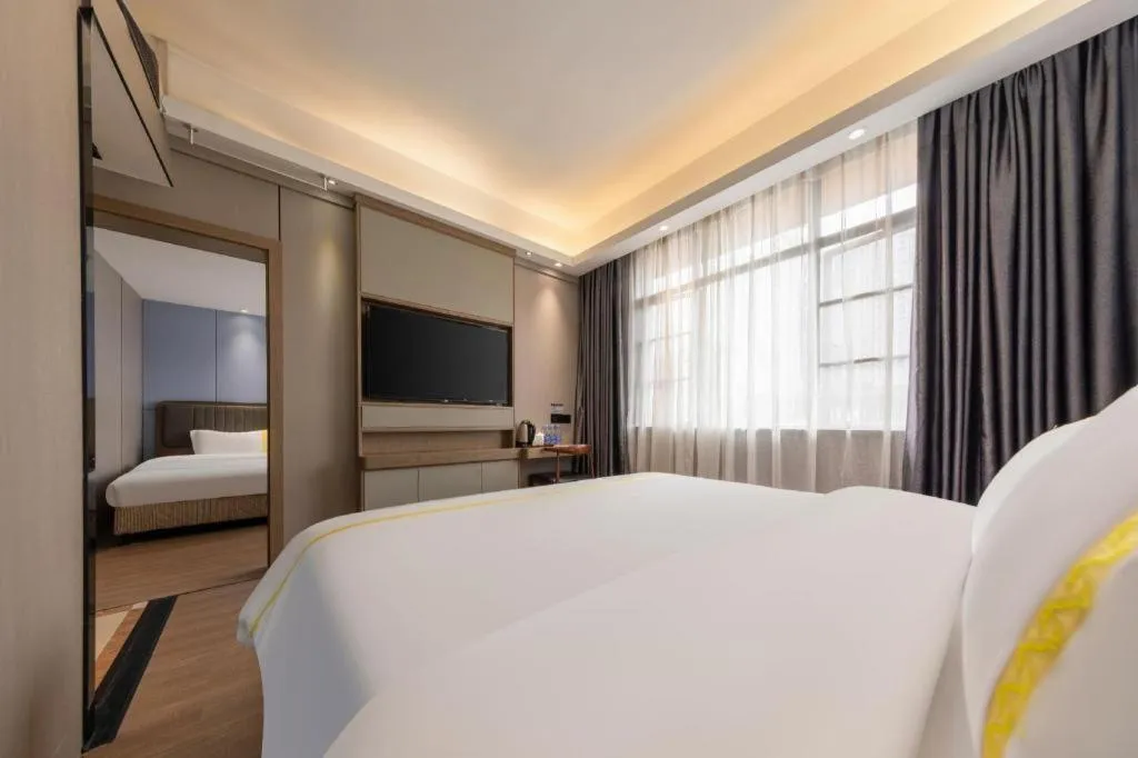 Bed in Mao Hua hotel