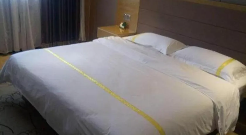 Bed in Mao Hua hotel