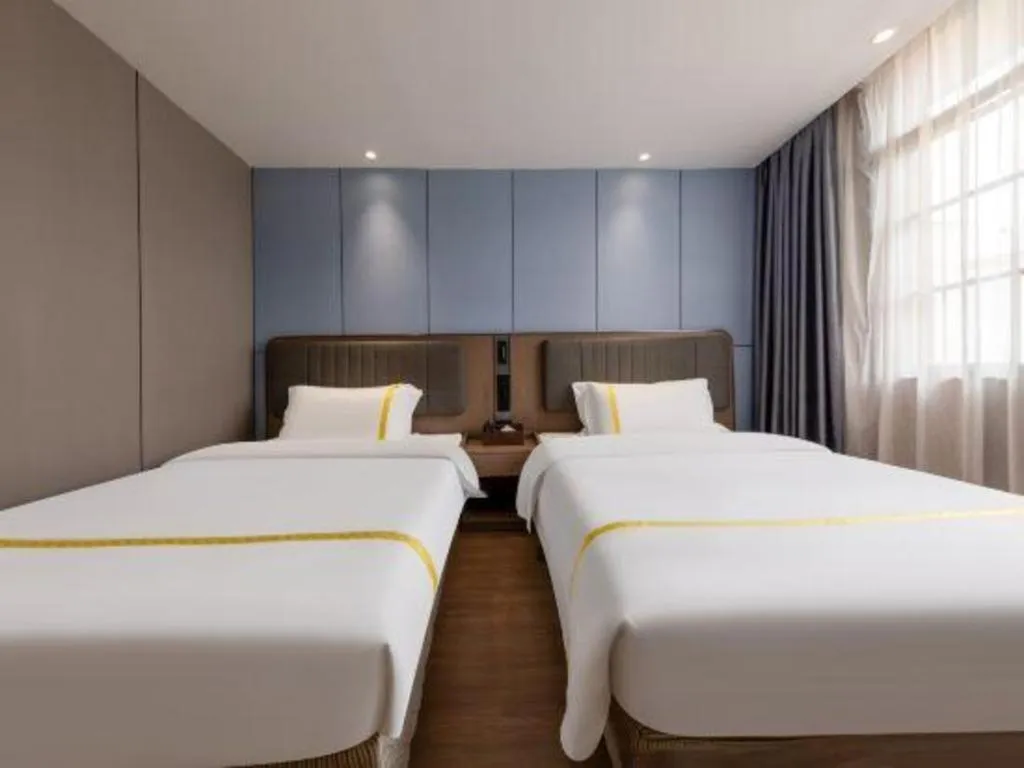 Bed in Mao Hua hotel