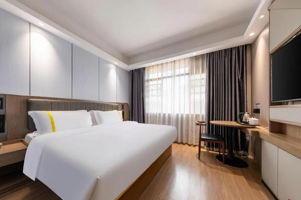 Bed in Mao Hua hotel