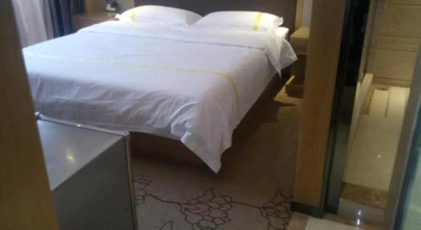 Bed in Mao Hua hotel