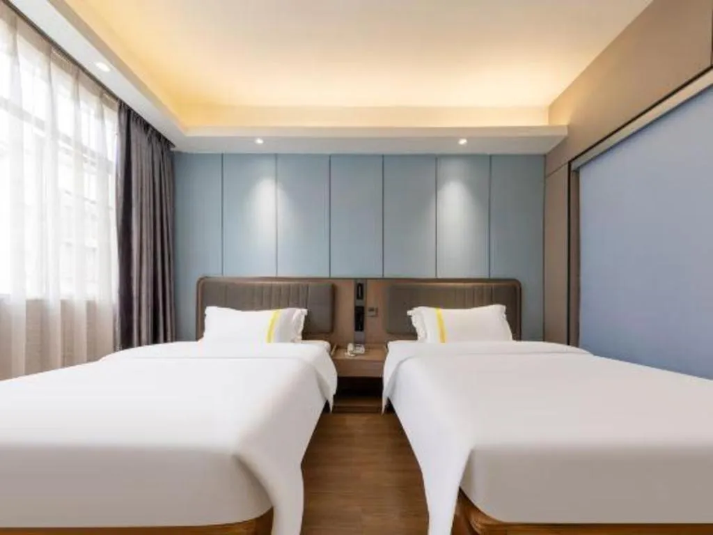 Bed in Mao Hua hotel