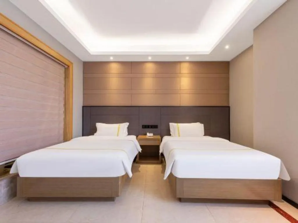 Bed in Mao Hua hotel
