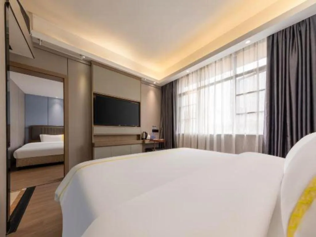 Bed in Mao Hua hotel