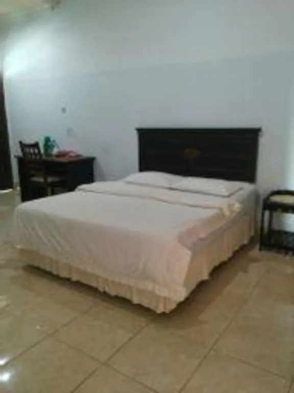 Bed in Avicenna Hotel