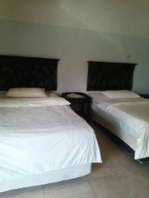 Bed in Avicenna Hotel