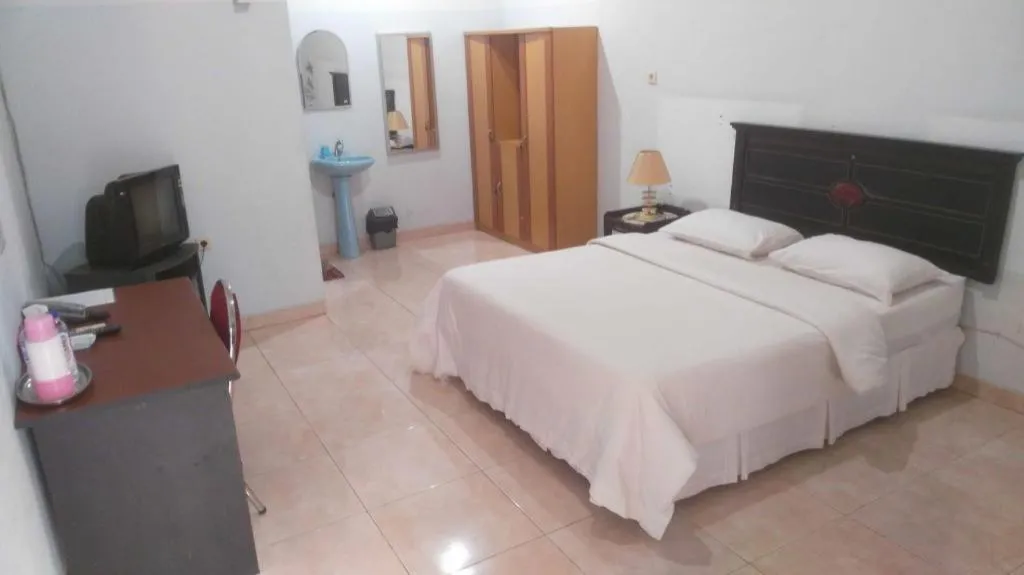 Bed in Avicenna Hotel