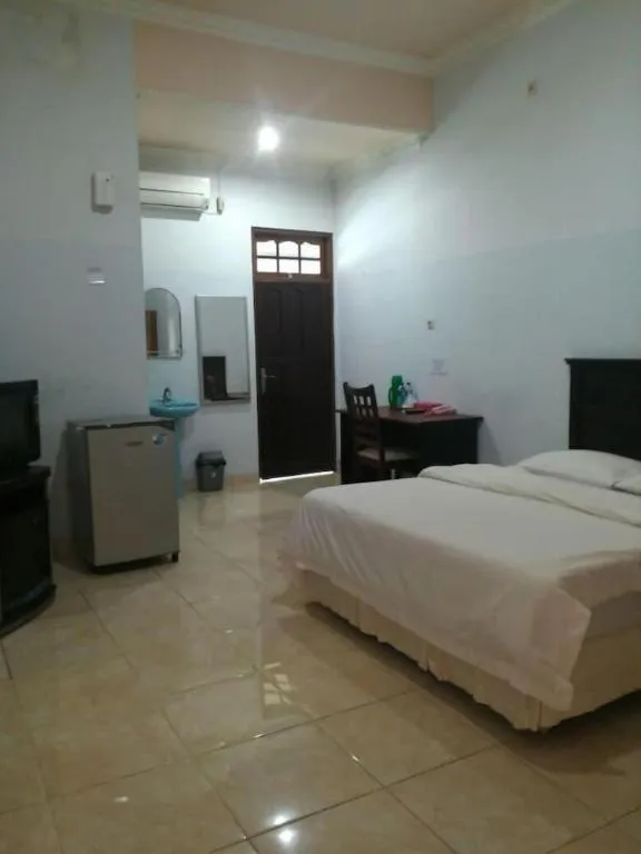 Bed in Avicenna Hotel