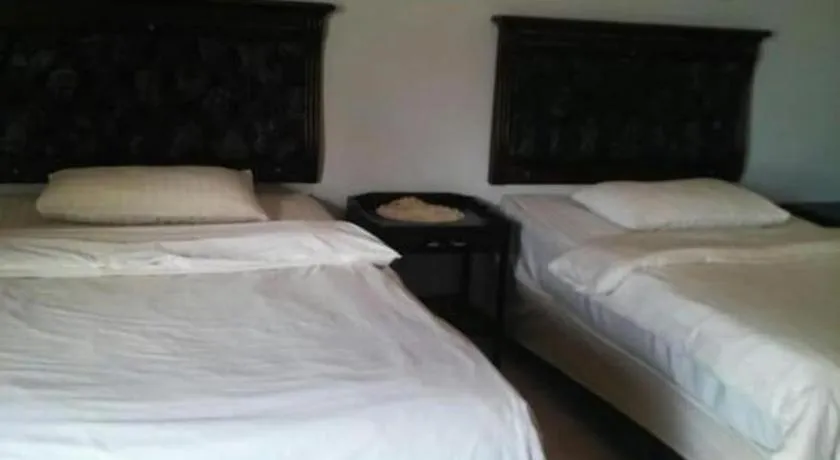 Bed in Avicenna Hotel