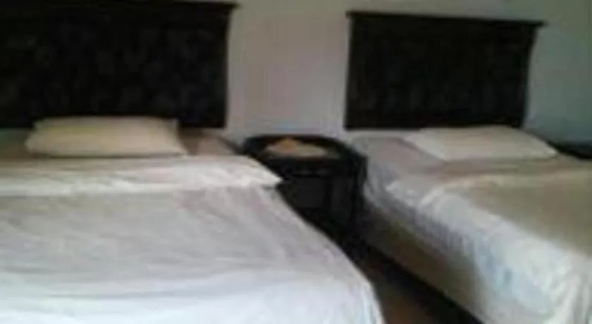 Bed in Avicenna Hotel