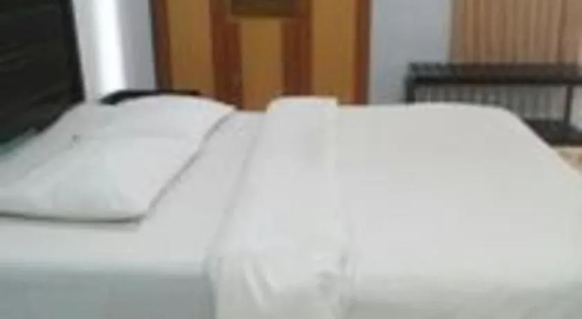 Bed in Avicenna Hotel