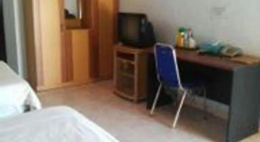 Bed in Avicenna Hotel