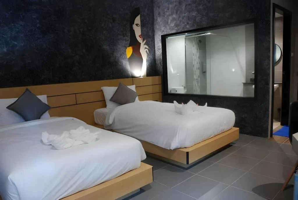 Bed in Hide & Seek Resort Krabi