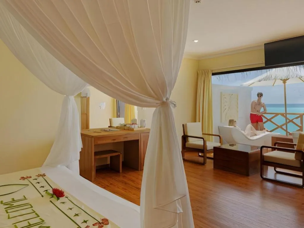 Bed in Angaga Island Resort and Spa
