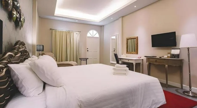 Bed in Verona Boutique Hotel - The Verona Co., Ltd