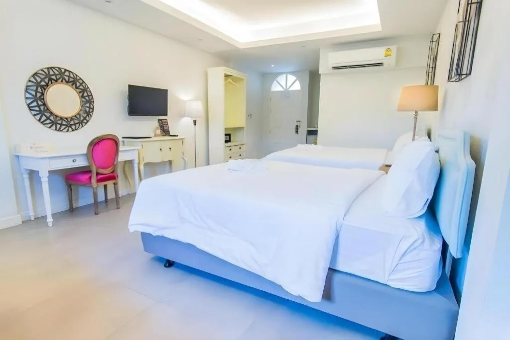 Bed in Verona Boutique Hotel - The Verona Co., Ltd